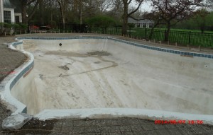 Pool drained and surface being prepared for a new one 